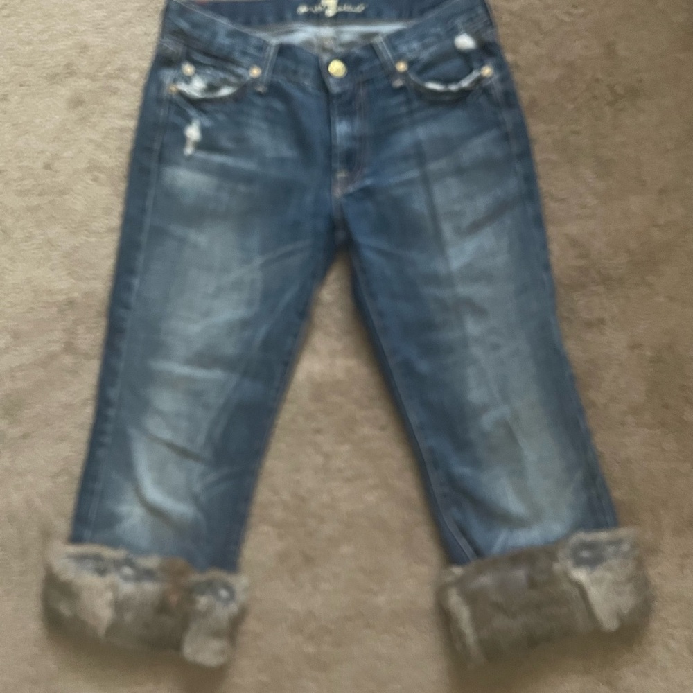 7 For All Mankind Blue Cropped Jeans with Fur Trim.